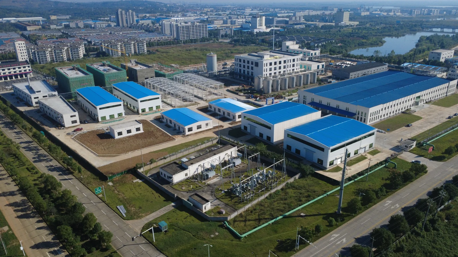 Manufacturing site in Hunan with completed buildings and construction areas visible
